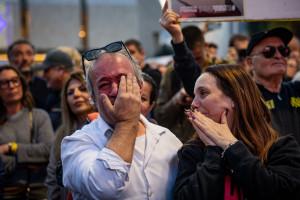 Israelis watch the release of three hostages from Hamas captivity as part of a deal between Israel and Hamas, at hostage square in Tel Aviv, January 19, 2025. Photo by Yonatan Sindel/Flash90