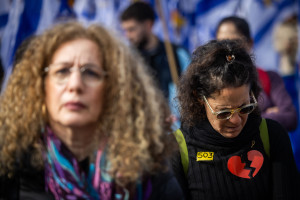 People gather at Hostage square in Tel Aviv, on the day of the release of the bodies of four Israeli hostages from Hamas captivity, February 20, 2025. Photo by Chaim Goldberg/Flash90