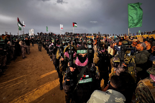 Members of the Al-Qassam Brigades guard in Khan Yunis, February 20, 2025. Saeed Mohammed/Flash90