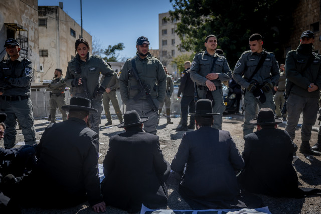 Ultra orthodox Jews protest against the drafting of ultra orthodox jews outside an IDF Recruitment Center in Jeursalem, February 25, 2025. Photo by Chaim Goldberg/Flash90