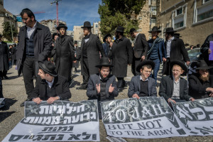 Ultra orthodox Jews protest against the drafting of ultra orthodox jews outside an IDF Recruitment Center in Jeursalem, February 25, 2025. Photo by Chaim Goldberg/Flash90