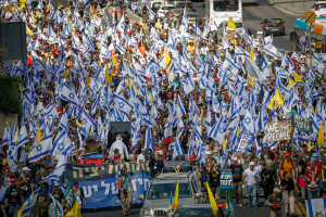 Israelis attend a protest march against the decision of Israeli prime minister Benjamin Netanyahu to fire head of Shin Bat Ronen Bar, at the entrance to Jerusalem, March 19, 2025. Photo by Yonatan SIndel/Flash90
