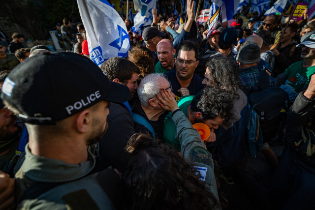 Israelis clash with police during a protest against Israeli prime minister Benjamin Netanyahu and his government, outside the Prime Minister’s Residence in Jerusalem, March 23, 2025. Photo by Yonatan Sindel/Flash90