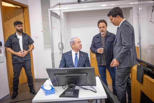 Israeli Prime Minister Benjamin Netanyahu arrives to the courtroom at the Distrcit court in Tel Aviv, before the start of his testimony in the trial against him, March 31, 2025. Photo by Miriam Alster/Flash90