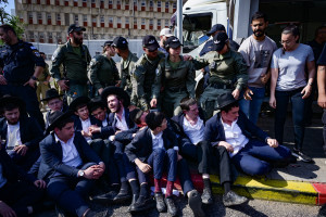 Ultra orthodox Jews clash with police during a protest against the drafting of ultra orthodox jews to the Israeli army, outside the IDF Recruitment Center at Tel Hashomer, in central Israel, April 28, 2025 Photo by Avshalom Sassoni/Flash90