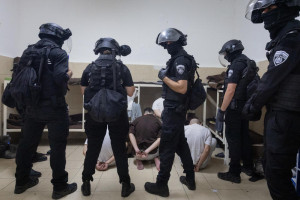 Israeli prison service guards operate in a special wing of Israeli citizens accused of spying for Iran, in the Damon Prison, in the Druze town of Daliyat al-Karmel, northern Israel, July 1, 2025. Photo by Chaim Goldberg/Flash90