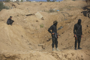 Heavy machinery works alongside members of Saraya al-Quds and teams affiliated with the Egyptian delegation as they search beneath the rubble for the remains of an Israeli hostage in the Nuseirat neighborhood of Gaza City, November 21, 2025. Photo by Ali Hassan/Flash90