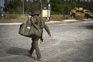 IDF reserve soldier carrying the IDF's iconic 'kitbag' during a surprise military drill in northern Israel along the border with Lebanon and Syria, Golan Heights, November 24, 2025. Photo by Michael Giladi/Flash90