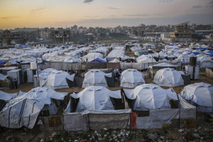 Displaced Palestinians seen around their tents in the Bureij area of the central Gaza Strip, January 10, 2026. Photo by Ali Hassan/Flash90