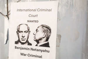 Washington, D.C. US - December 27, 2024: a poster accusing Benjamin Netanyahu to be a war criminal wanted by International Criminal Court with his mugshot in the center. Photo: Shutterstock.