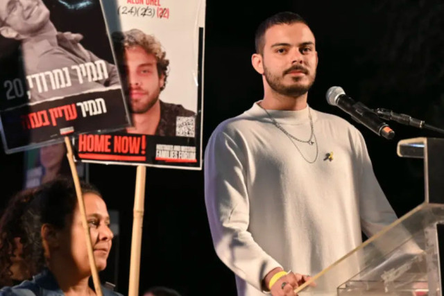 Released hostage Omer Wenkert speaks at a rally at Hostages Square in Tel Aviv, April 5, 2025. Photo: screenshot from Jpost