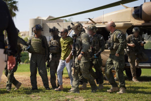 Qaid Farhan Alkadi being rescued from the Gaza Strip by IDF troops. Photo: IDF