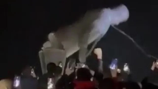 The toppling of Hafez al-Assad's statue in Homs. Photo: Social media - used under section 27A of the copyright law