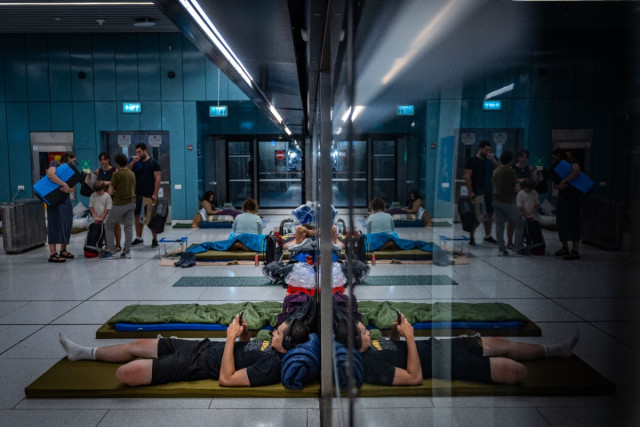 People take shelter in an underground train station in Tel Aviv, during ongoing missile attacks from Iran, June 22, 2025. Photo by Yonatan Sindel/Flash90