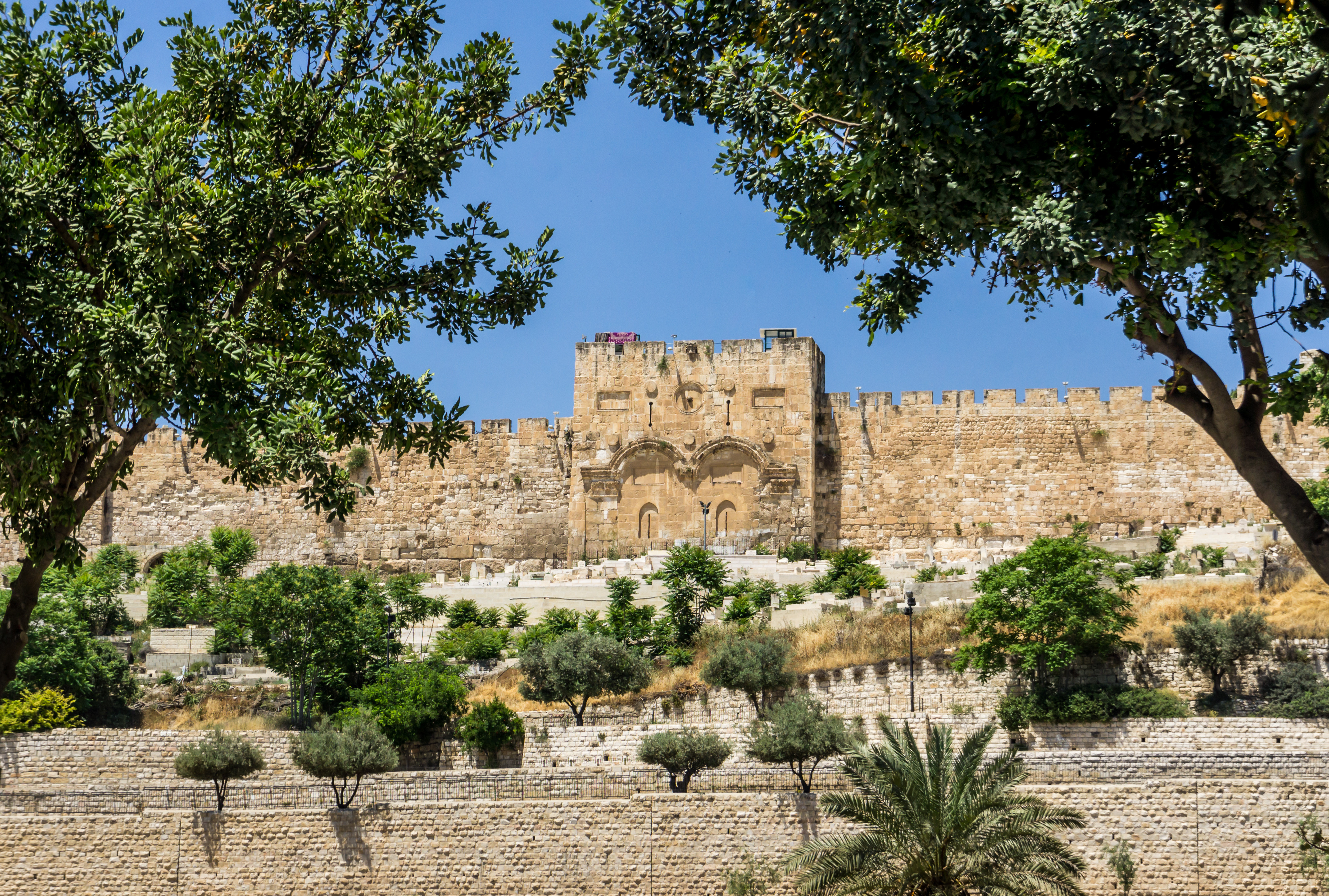 The Golden Gate or Gate of Mercy on the east-side of the Temple Mount of the Old City of Jerusalem in Israel. View from the Garden of Gethsemane.